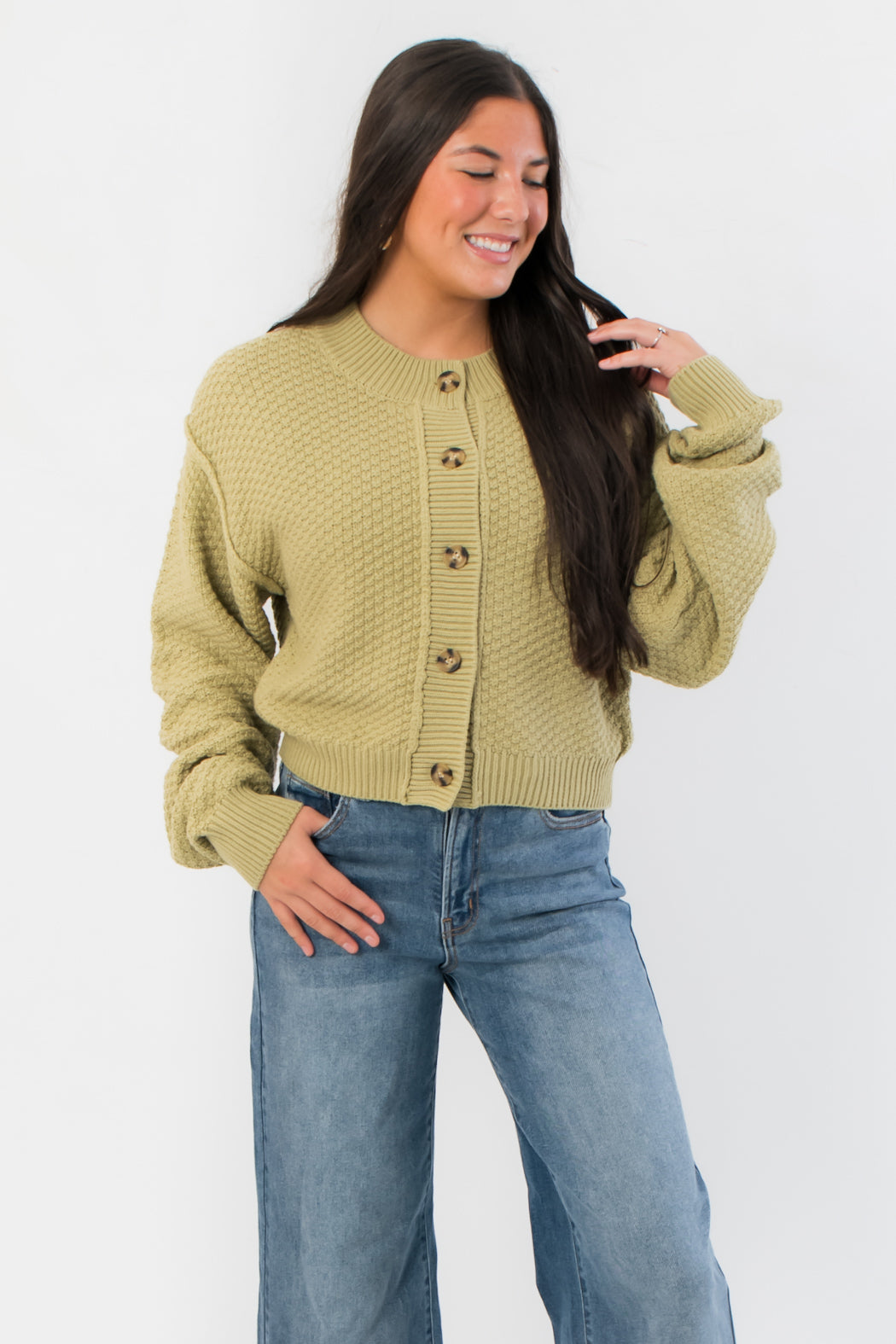 Free People Whispering Willow Lila Cardigan in textured knit with button front, shown in relaxed fit for fall layering.