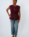 Burgundy and white striped sleeveless blouse with waist belt, perfect for fall fall workwear