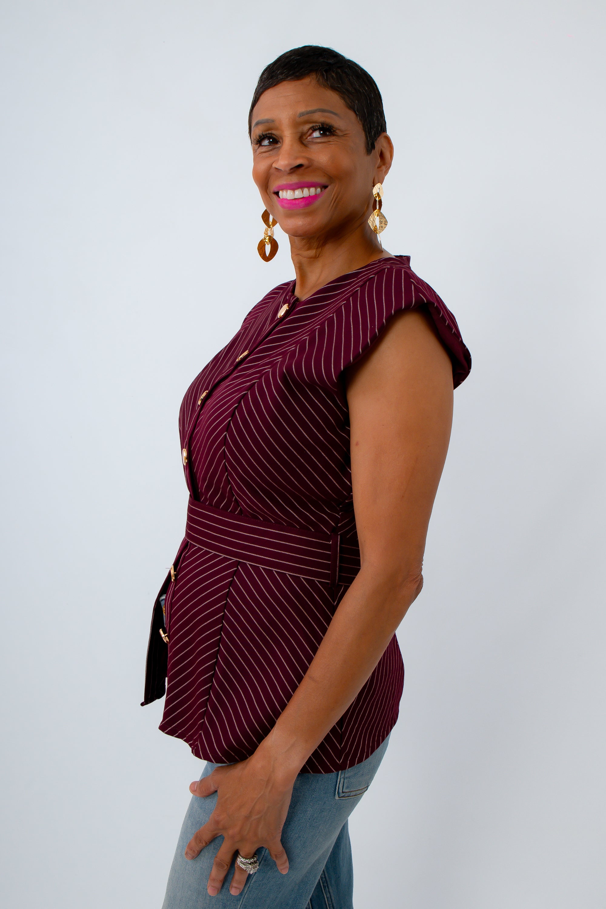 Striped top with waist belt and gold hardware for the ultimate University of South Carolina game day look