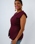 Striped top with waist belt and gold hardware for the ultimate University of South Carolina game day look