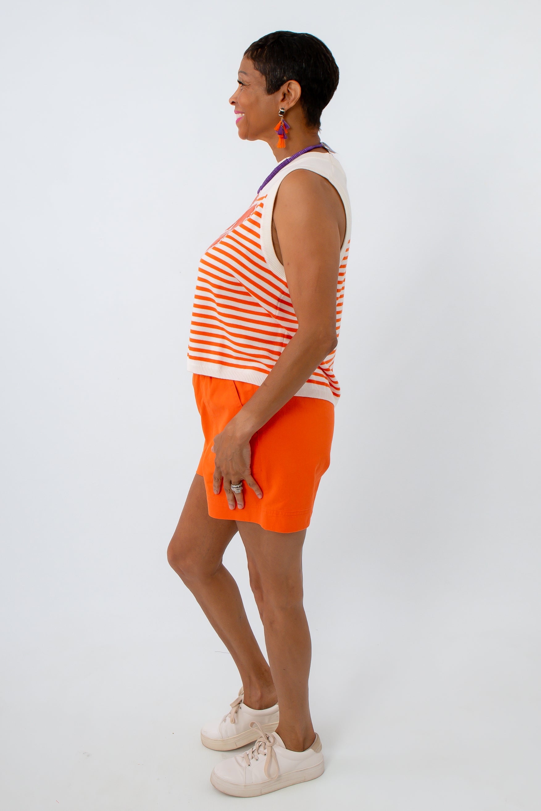 Sequin and beaded tiger paw knit tank with orange denim shorts for clemson game day look