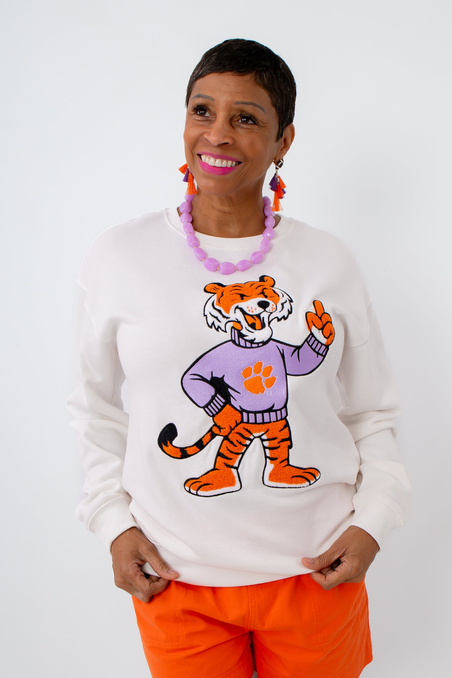 White Clemson tiger mascot sweatshirt with tiger patch on it for clemson game day 
