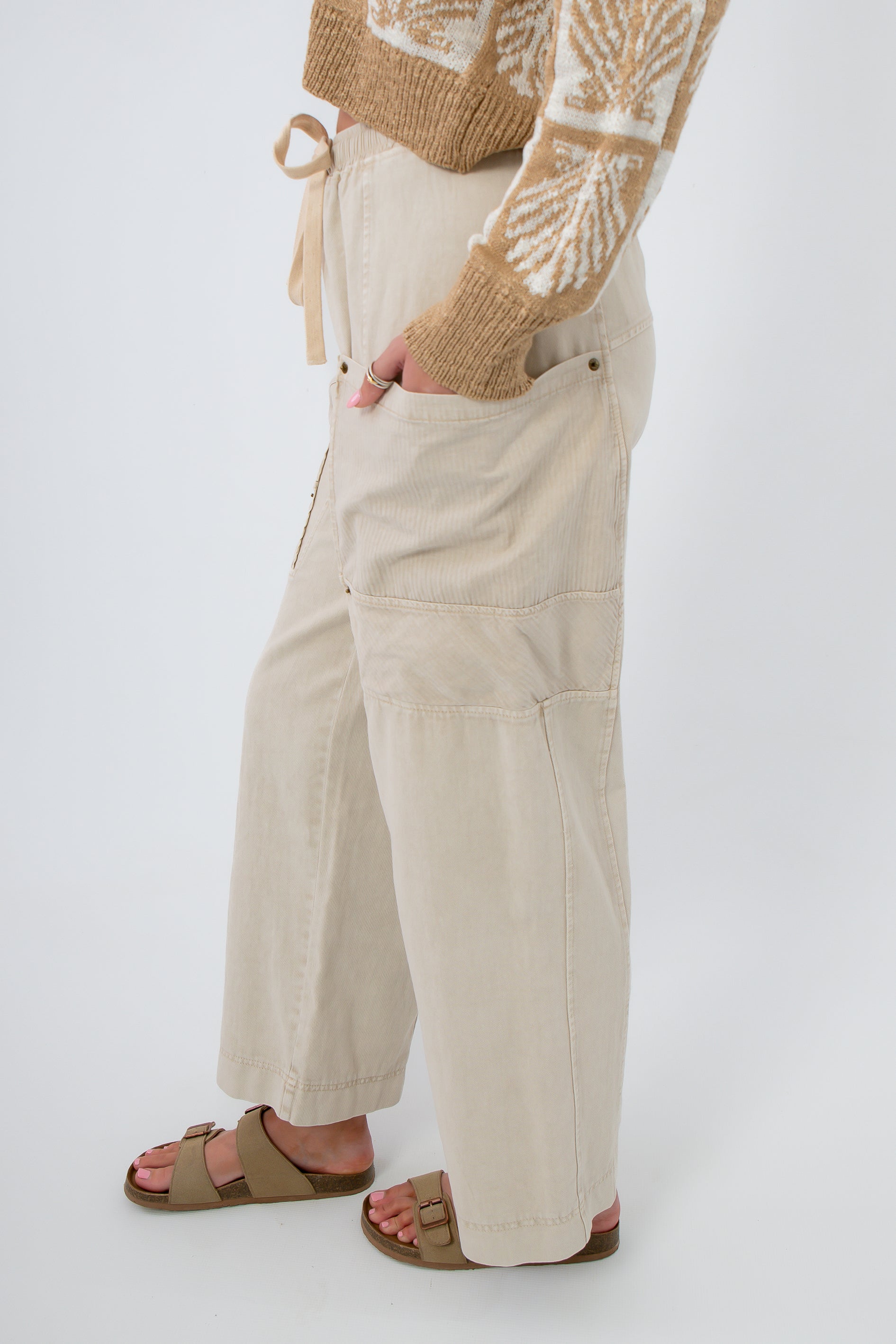 Side view of Breezy Natural Linen Cargo Pocket Pants highlighting functional cargo pockets and soft linen texture for casual comfort.