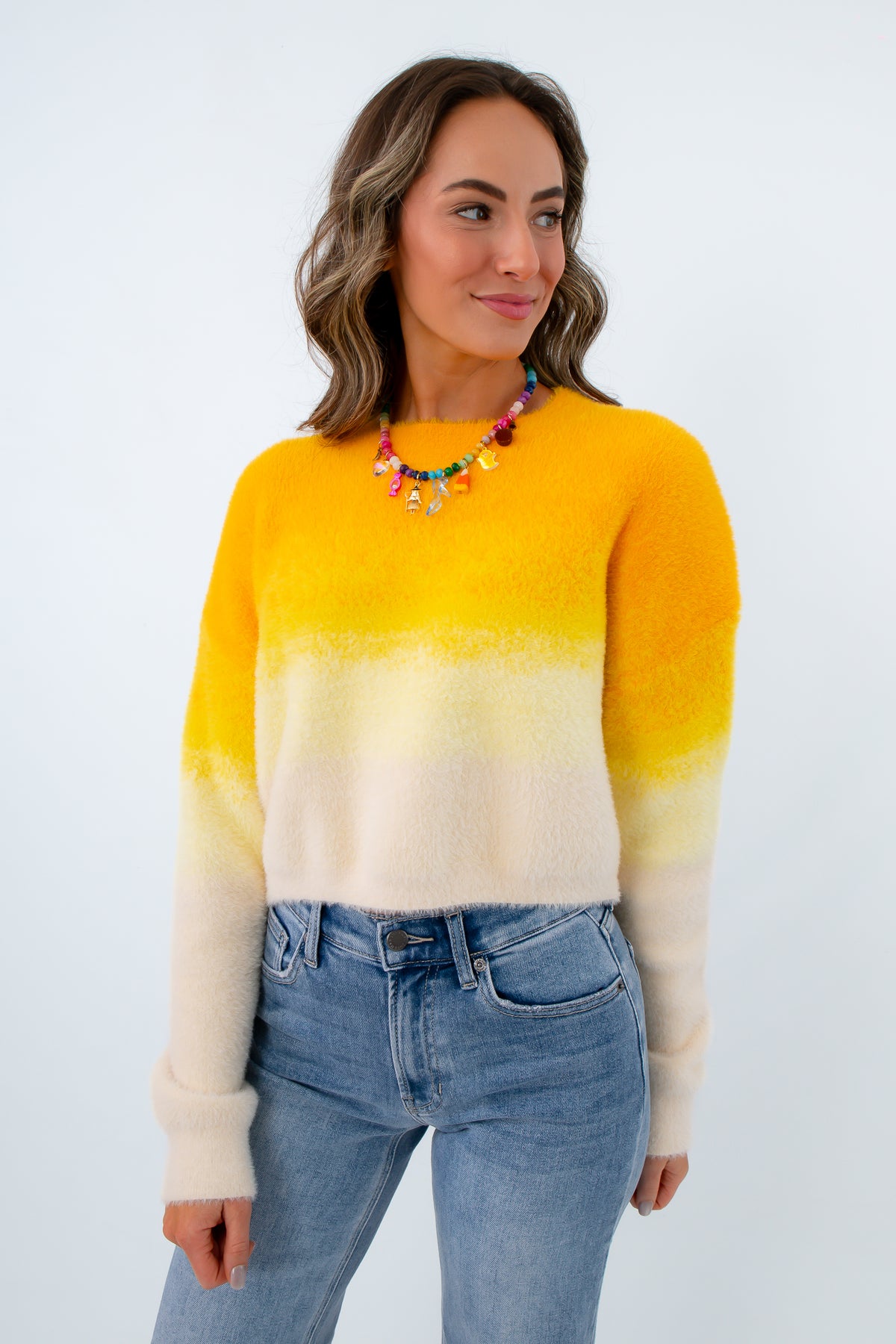 colorful candy corn inspired boutique sweater for halloween trick or treating