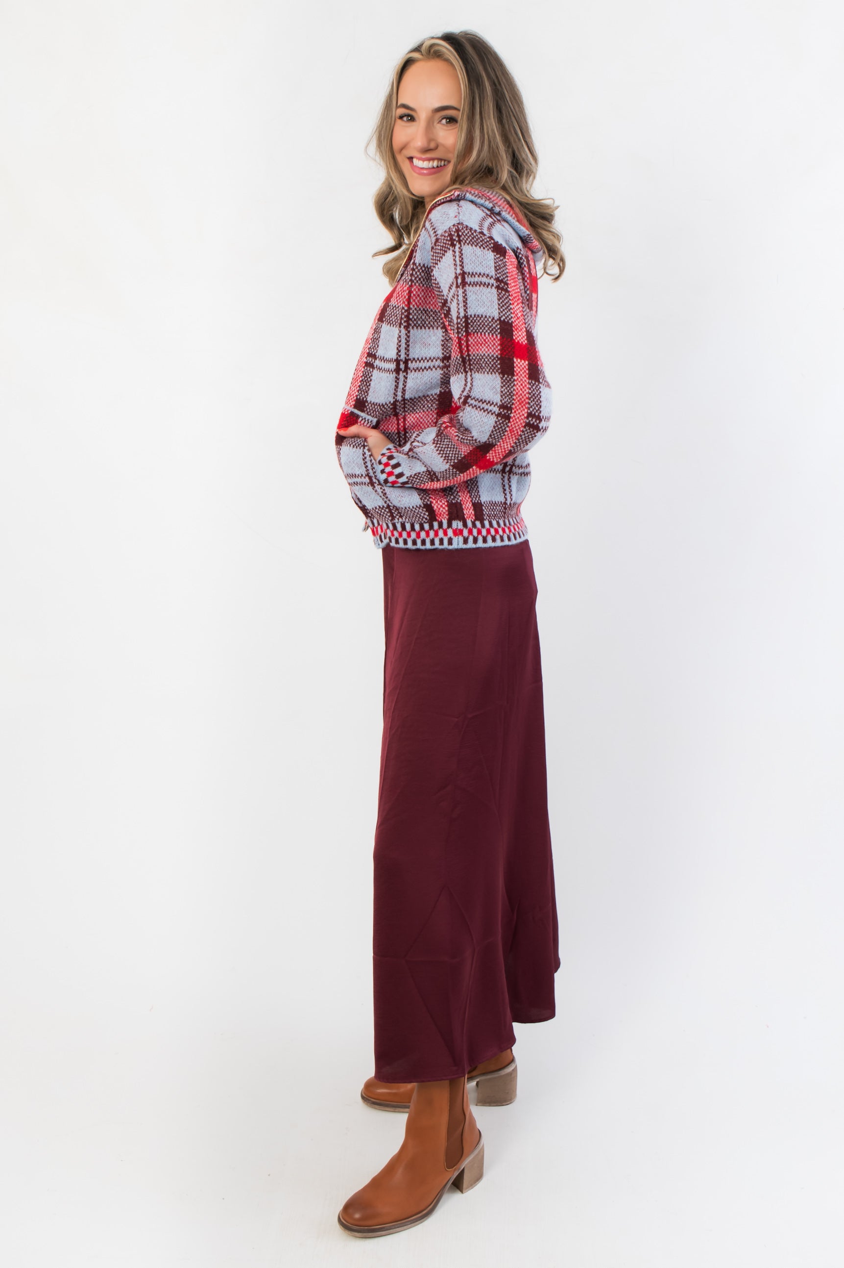 Side view of the Z Supply Merlot Northpointe Satin Midi Skirt showcasing its smooth satin texture and flattering A-line silhouette.