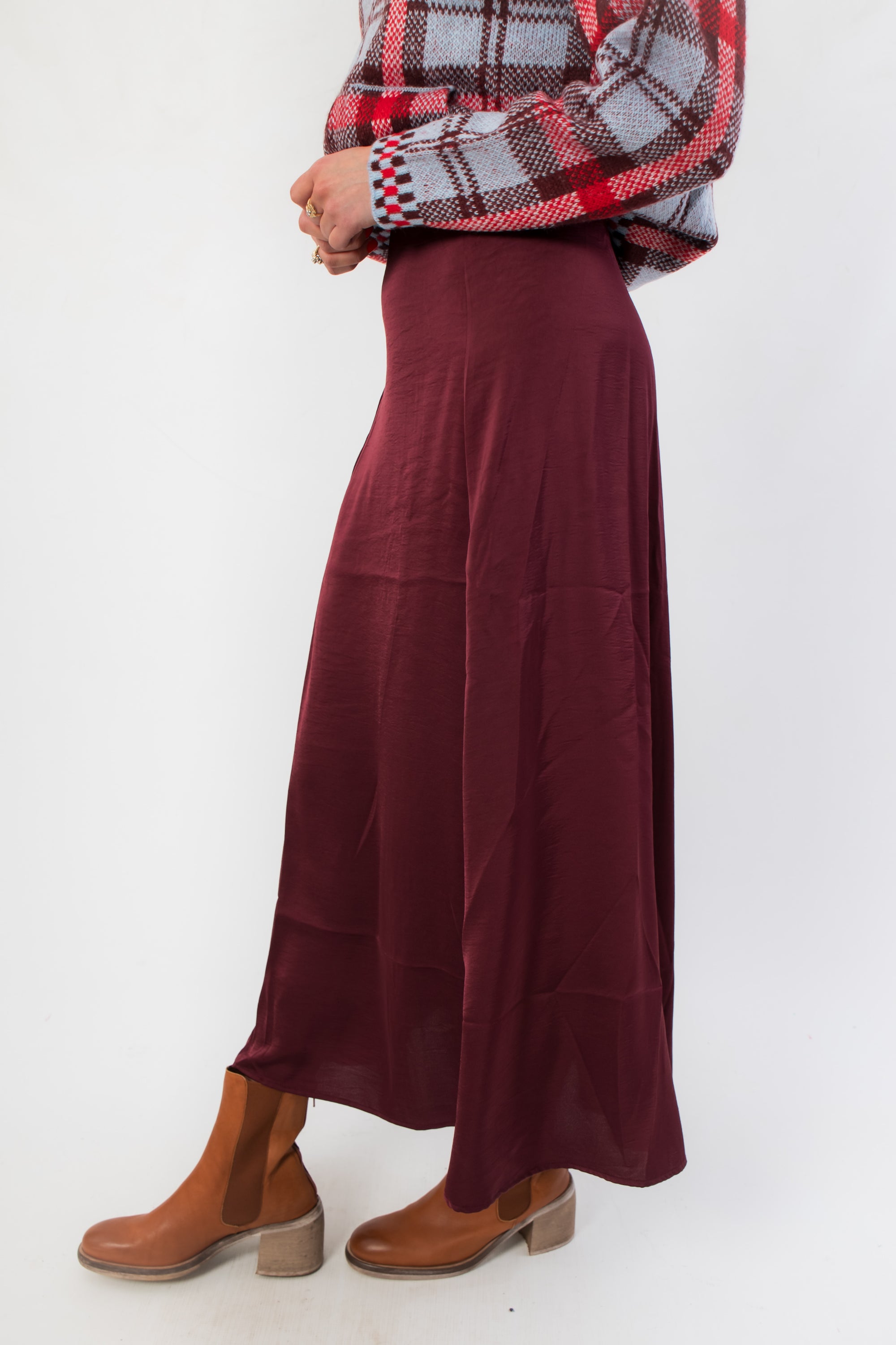 Close-up side angle of the Z Supply Merlot Northpointe Satin Midi Skirt highlighting its elegant drape and flowy satin fabric.