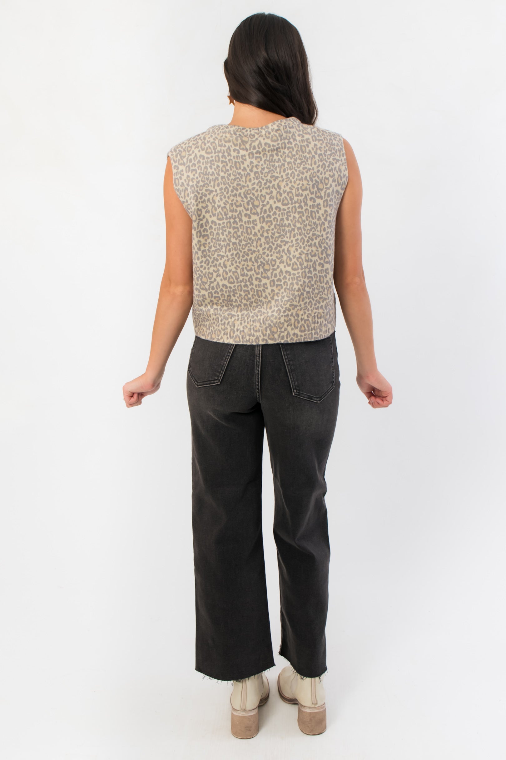LeAnn Button Down Leopard Sleeveless Cardigan – Stylish Layering back view highlighting full leopard print and clean hemline.