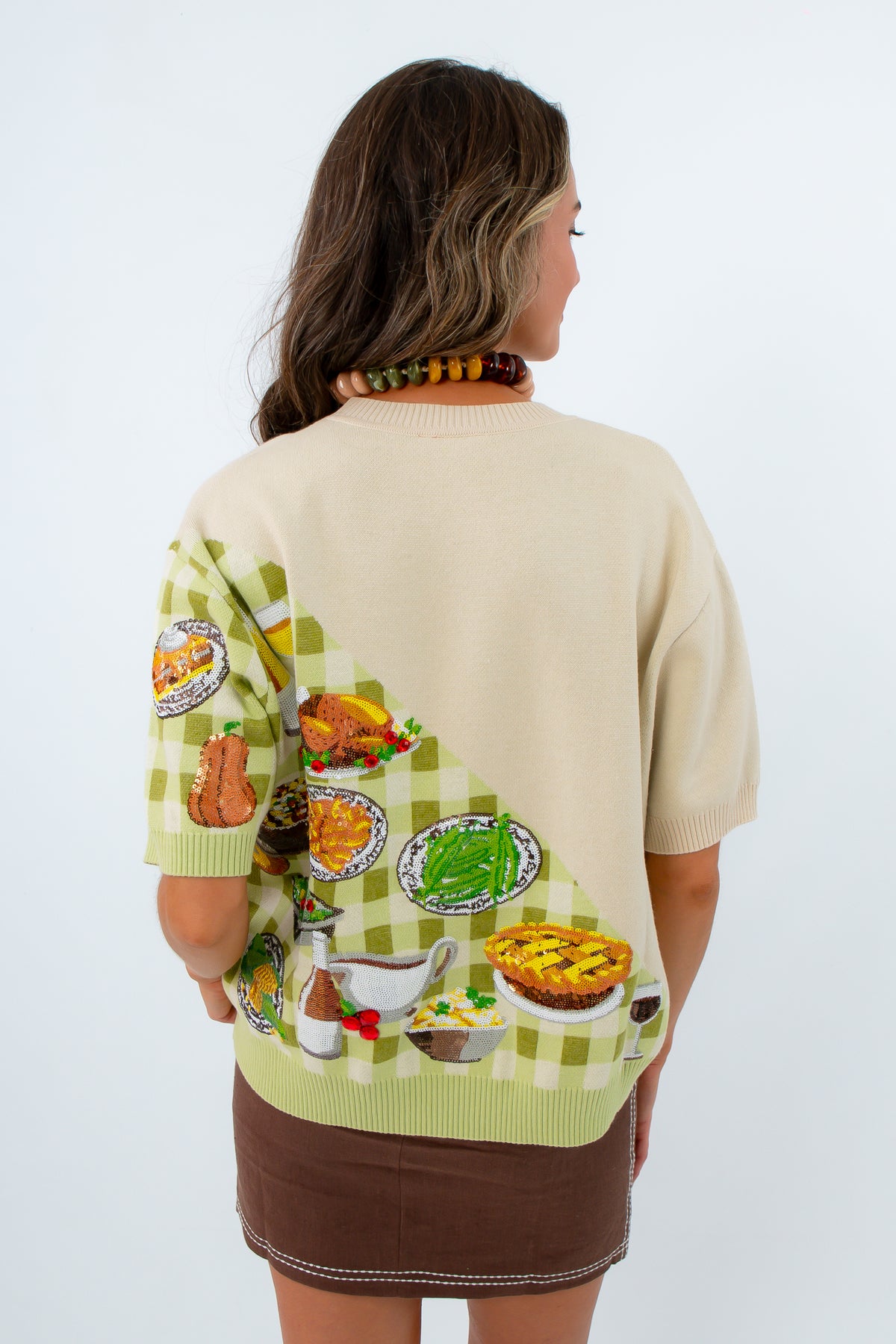 Sophisticated colorblock thanksgiving sweater for everyday wear, knit top with sequin thanksgiving meal on it, thanksgiving outfit, thanksgiving sweater