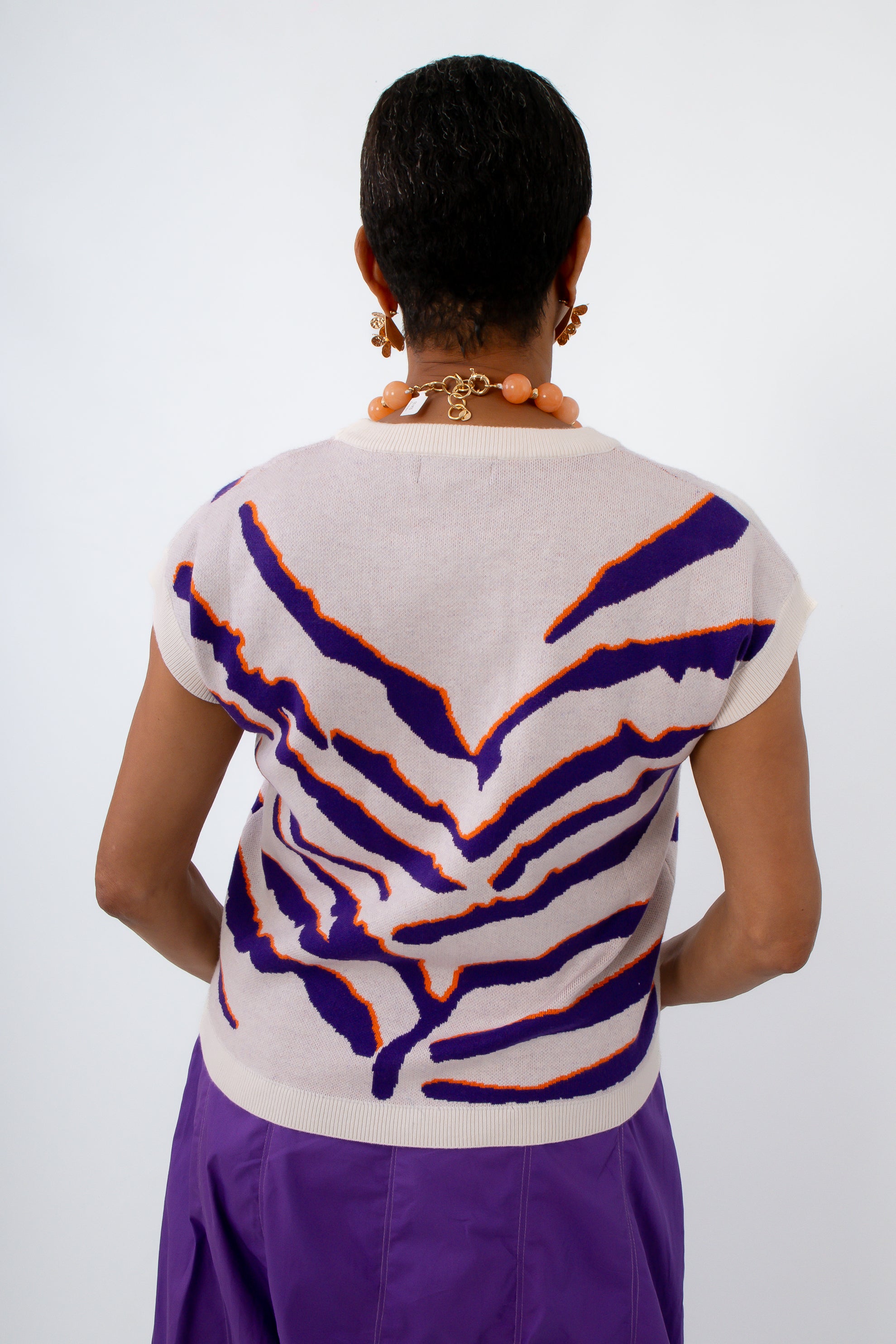 Clemson vs LSU game day outfit, purple tiger stripe sweater, sleeveless sweater, white and purple top