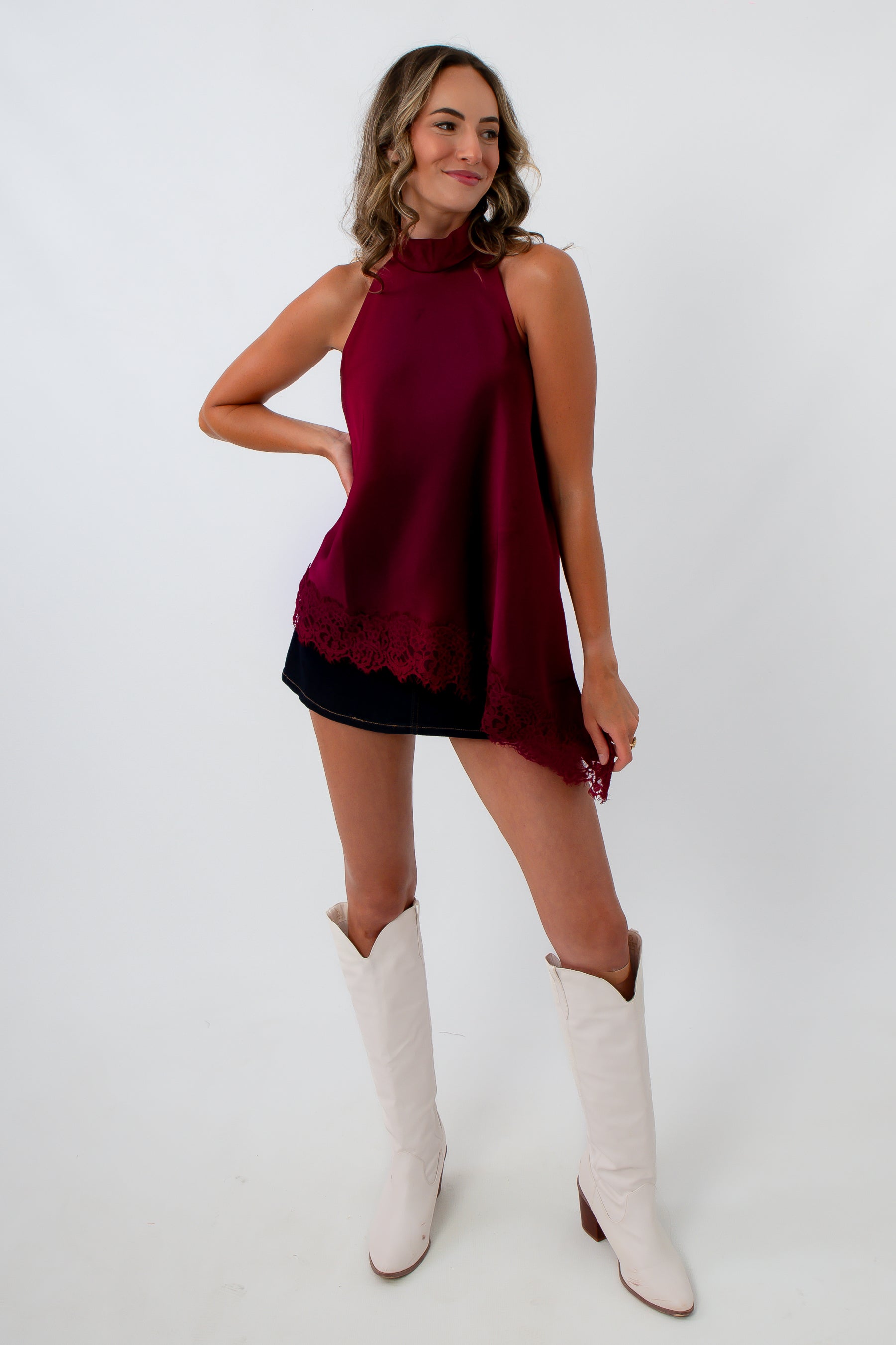 Burgundy lace top paired with black denim skirt for Alabama game day