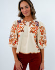 Cream top with colorful suede embroidery, cream suede top with fall floral detail, fall workwear, fall blouses