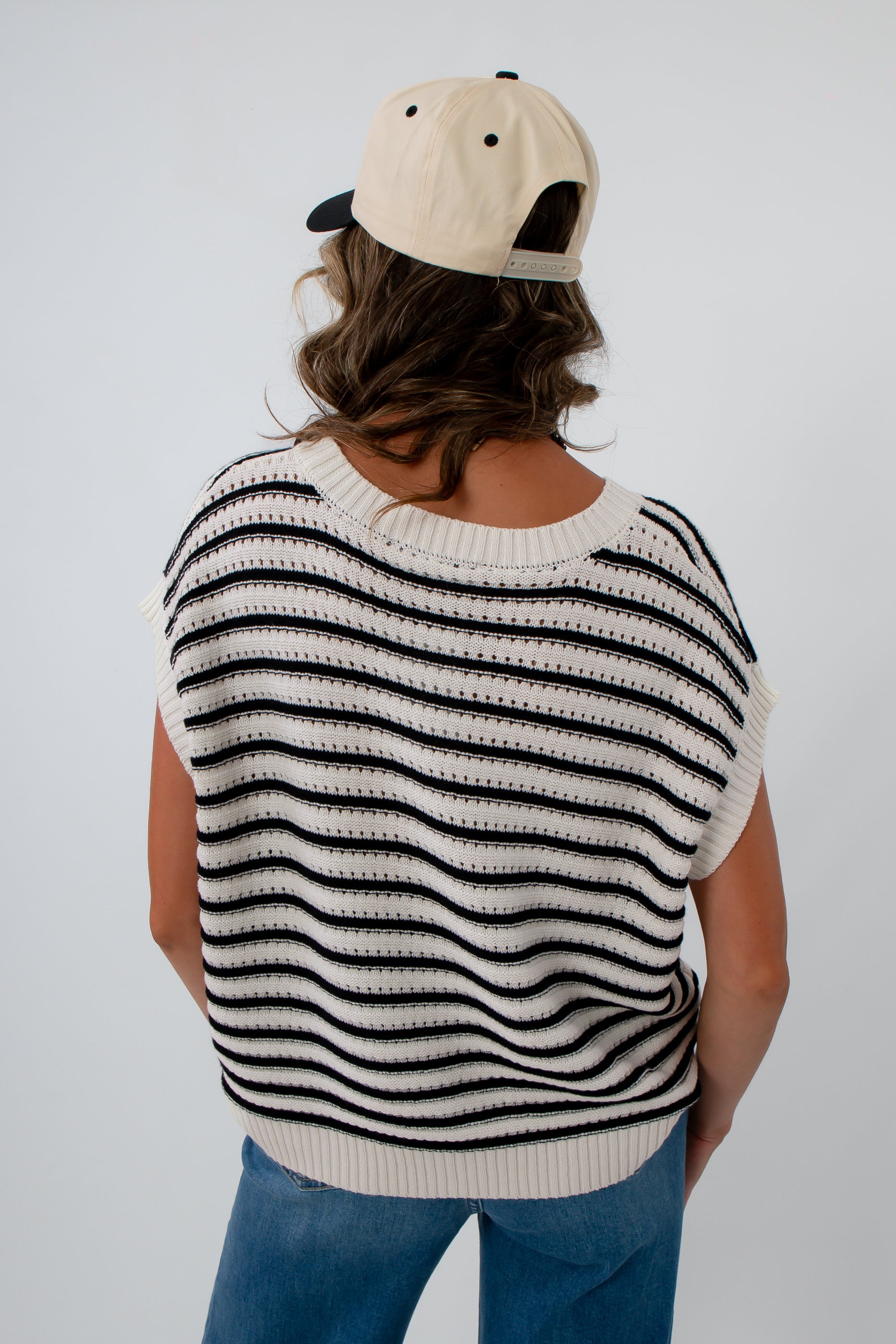USC and University of Georgia game day style, black and white striped top, neutral game day look