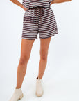 Brown and white striped knit shorts with front pockets, brown and white striped lounge shorts