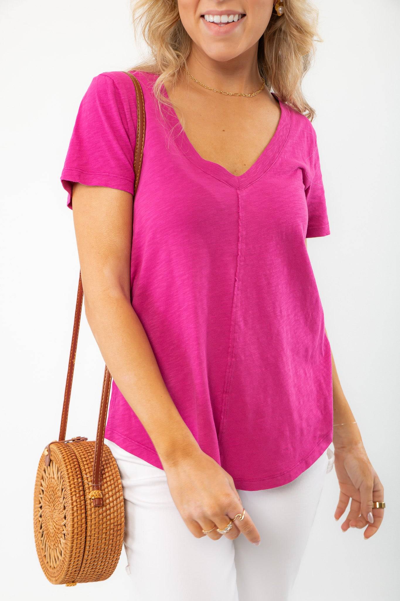 Close-up of Z Supply Magenta Asher V-Neck Tee, highlighting its curved hemline, soft fabric, and casual-chic appeal.