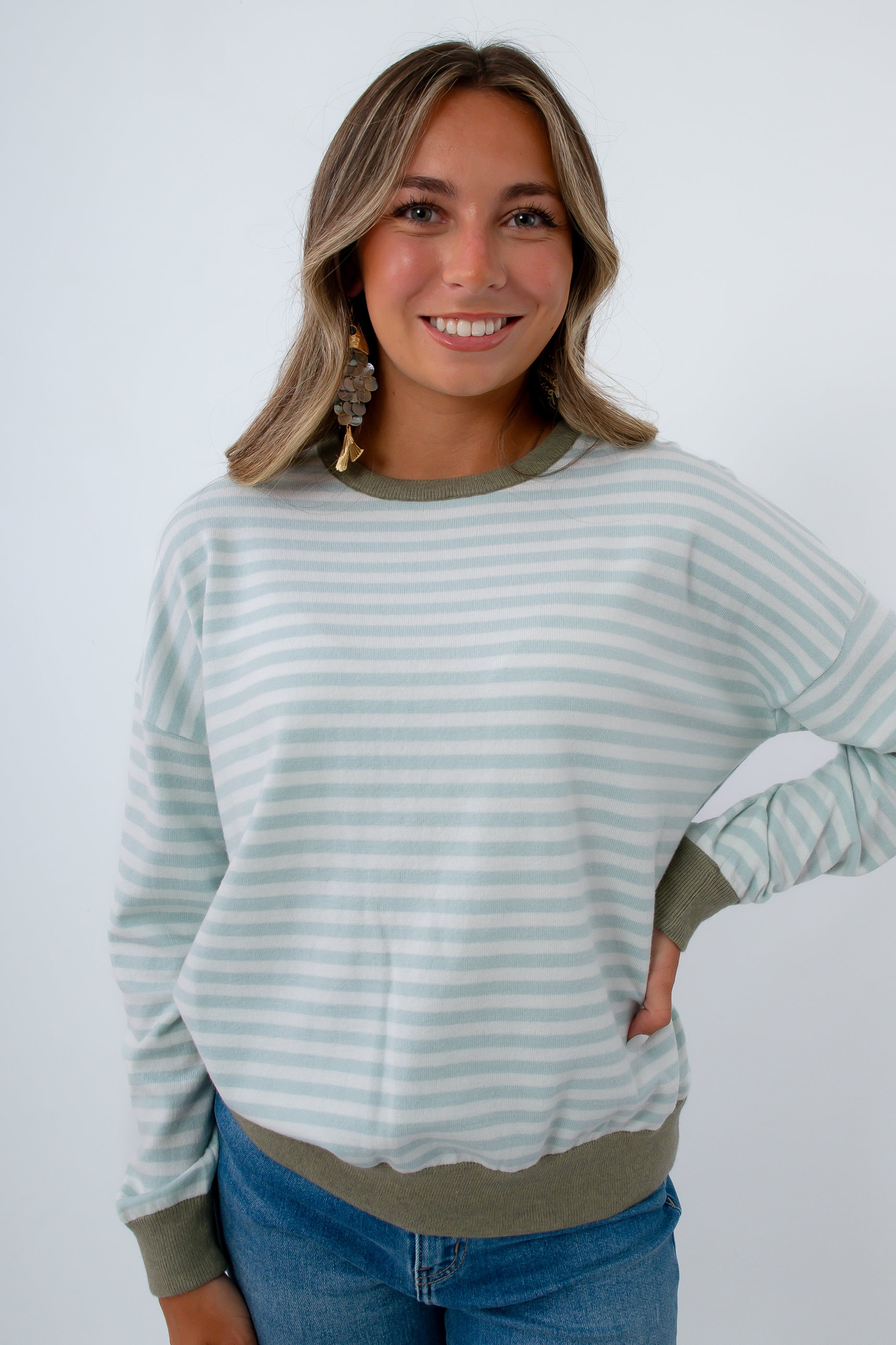 Blue and white striped sweater with green trim, Blue and white long sleeve top with green trim