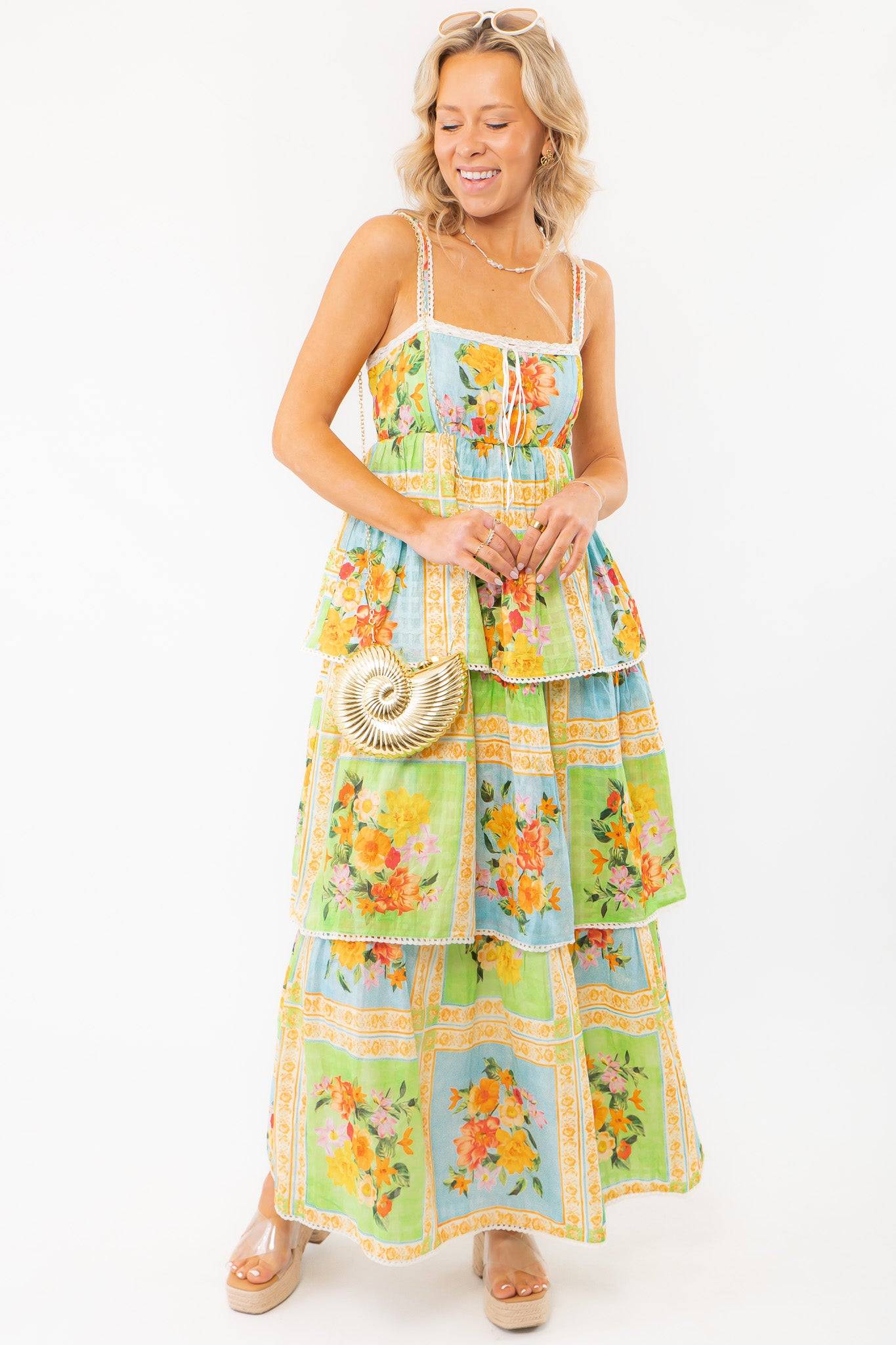 Lightweight and stylish Show Me Your Mumu Peyton Country Bouquet Midi Dress with a vibrant floral design, perfect for vacations and summer events.