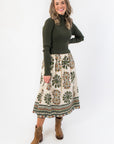 Fall-ready Channing Olive Green Contrast Midi Dress featuring long sleeves and a floral print skirt, ideal for holiday and Thanksgiving outfits.