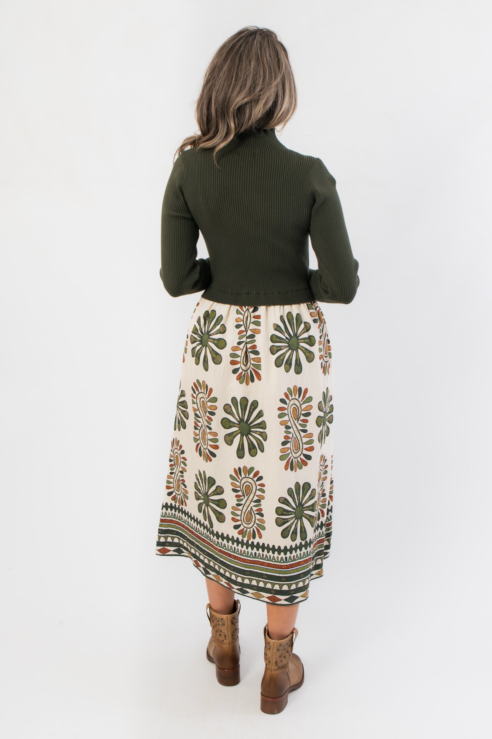 Back view of Channing Olive Green Contrast Midi Dress highlighting the seamless transition from ribbed bodice to floral midi skirt.