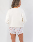 Back view of Fa La La White Festive Sweater – Cozy Holiday Knit highlighting its clean, solid white design and soft knit fabric.