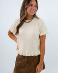Fall sweater for Thanksgiving outfit inspiration, neutral thanksgiving outfit, cream short sleeve sweater