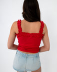 Red ruffle strap tank top with ruffle details