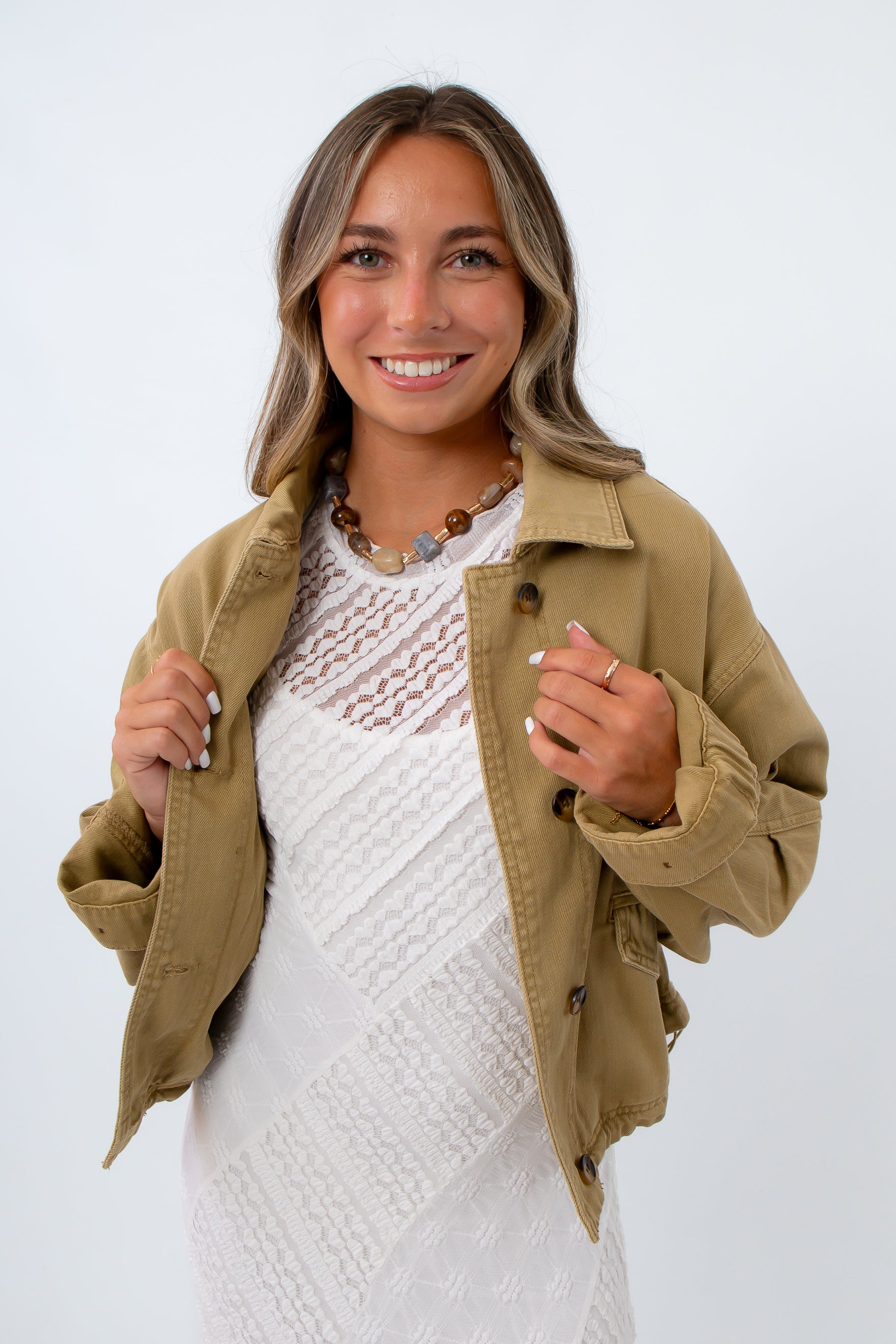 Cropped olive jacket with drawstring cinch for fall layering pieces