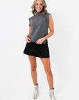 Rowan Grey Mockneck Sweater Tank paired with black mini skirt and silver boots, showcasing a chic knit top for casual wear.