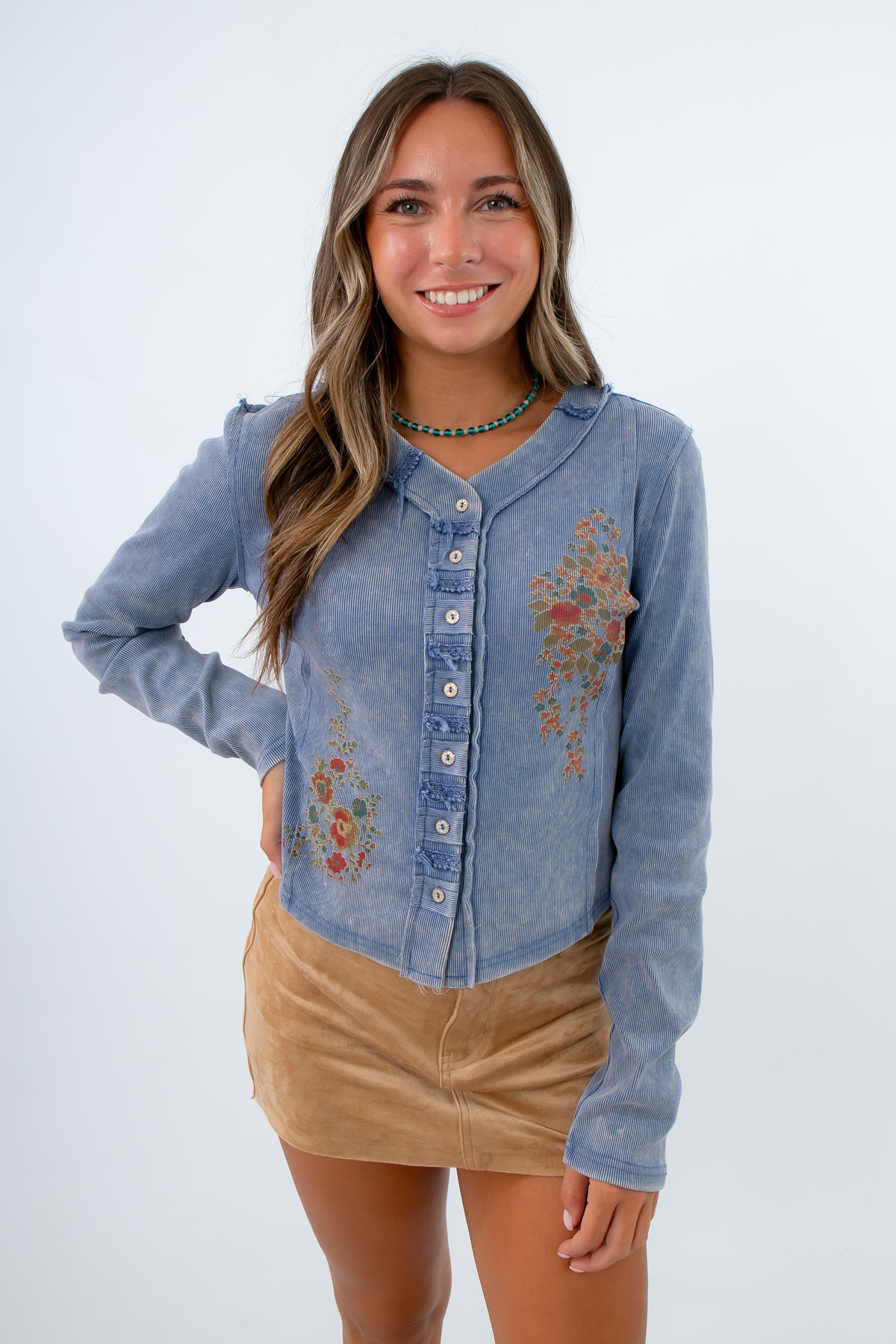 Fitted dusty blue henley shirt with floral detailing, blue henley with flowers on it, ribbed blue henley, dusty blue henley
