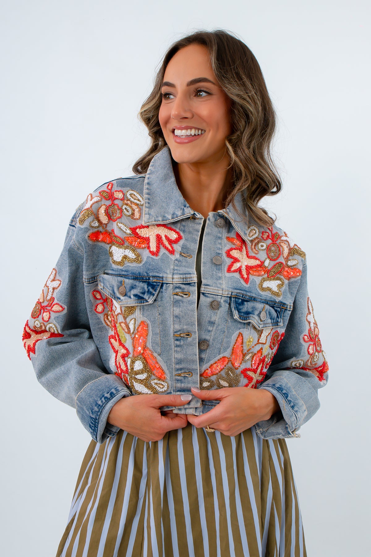 Lightwash denim jacket with orange and coral bead detailing, floral beaded jacket, denim jacket with floral design