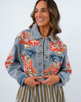 Lightwash denim jacket with orange and coral bead detailing, floral beaded jacket, denim jacket with floral design