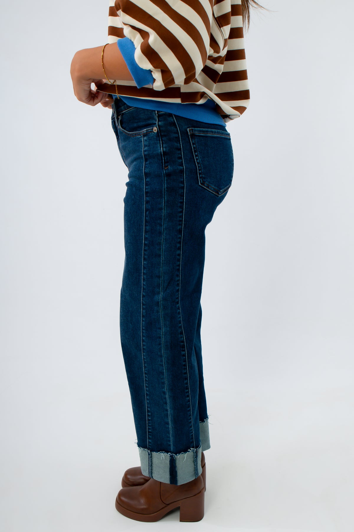 Women’s wide leg jeans featuring fading and seaming details, women's jeans with ankle cuff, women's cropped jeans in dark wash