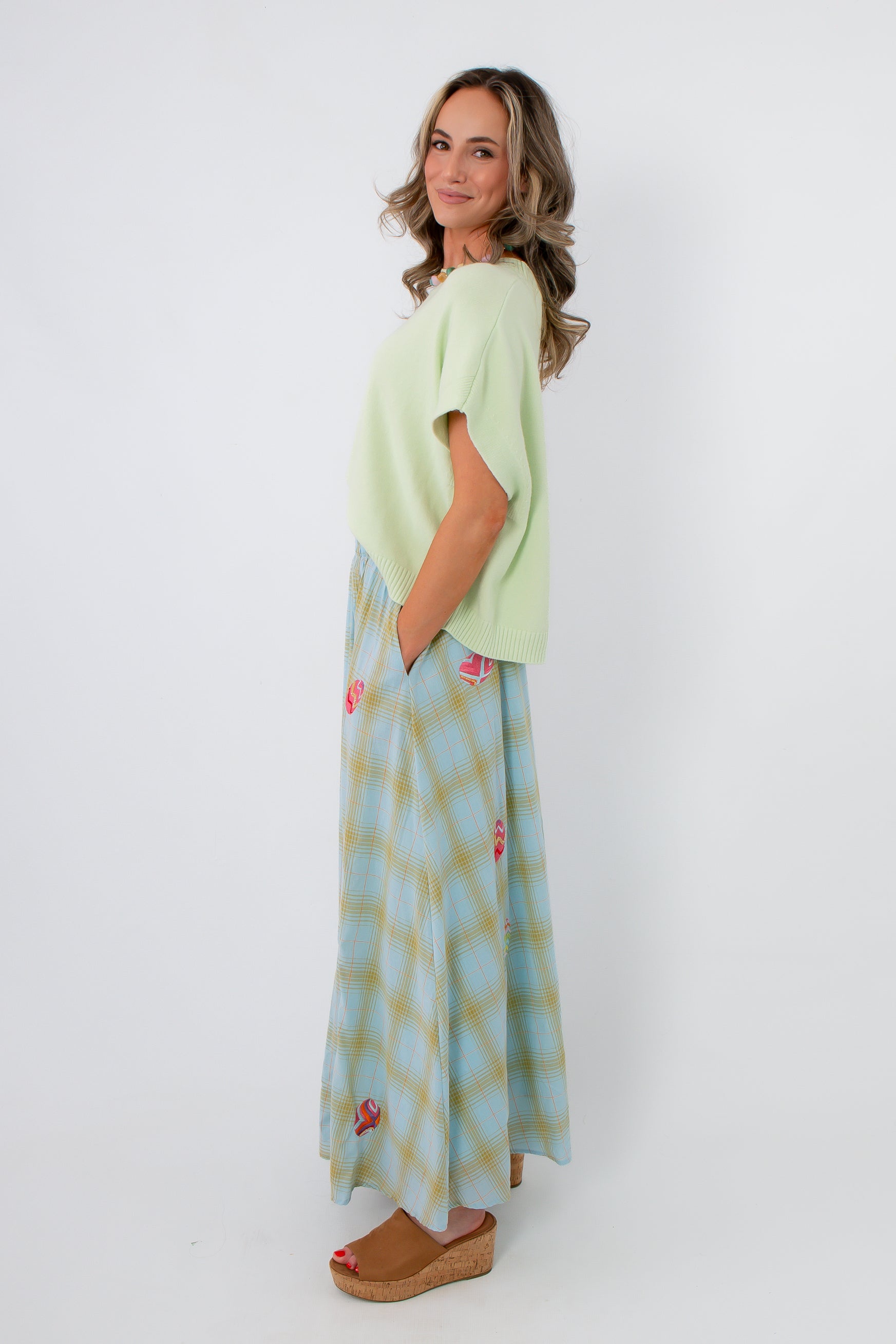Elegant plaid midi skirt with colorful embellishments for spring