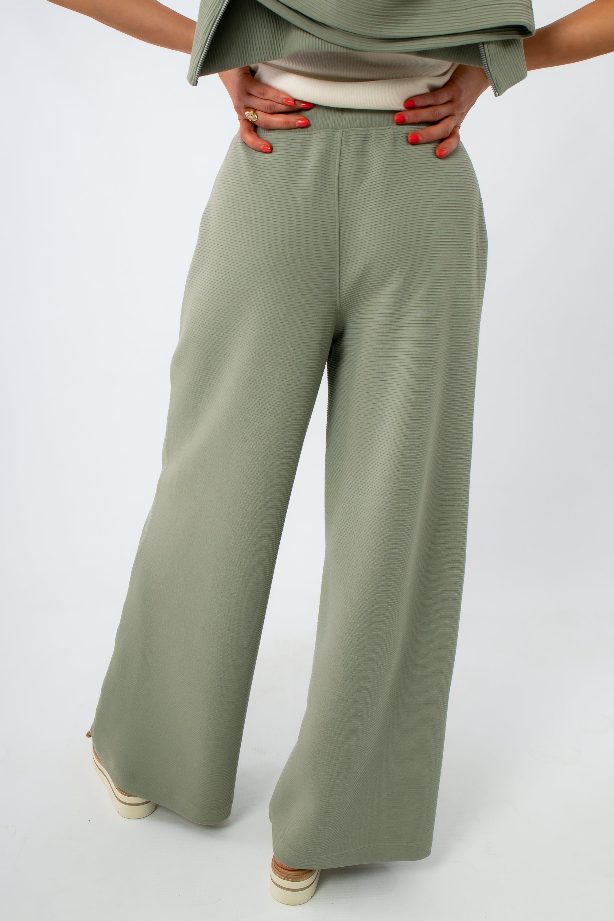 Olive green ribbed lounge pants with wide-leg fit