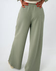 Olive green ribbed lounge pants with wide-leg fit