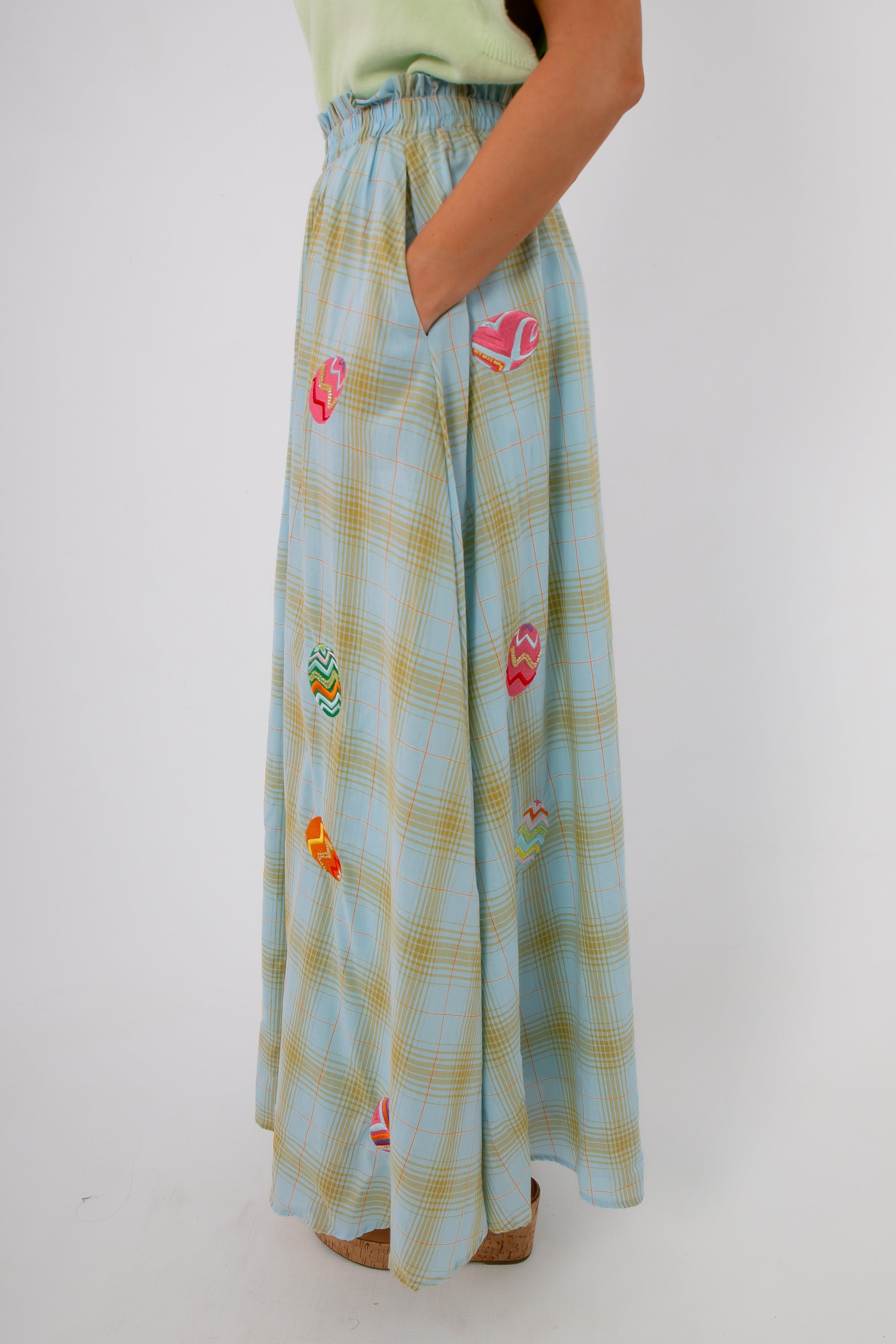 Easter-themed plaid midi skirt showcasing playful designs