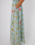 Easter-themed plaid midi skirt showcasing playful designs