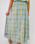 Queen of Sparkles plaid midi skirt with Easter egg appliqués