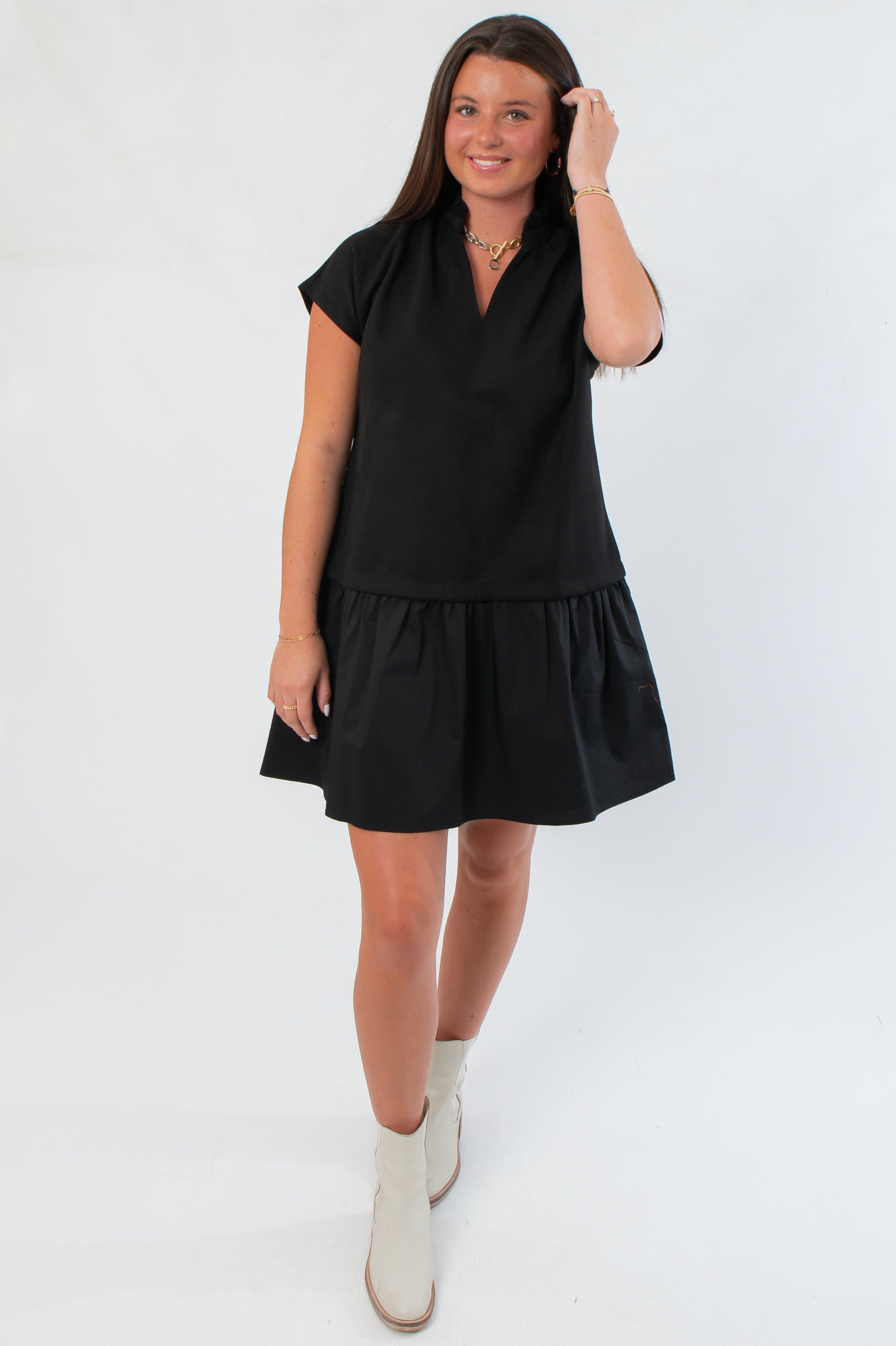 Front view of THML Elise Black Suede Mini Dress featuring a flared skirt and soft suede texture, perfect for day-to-night wear.