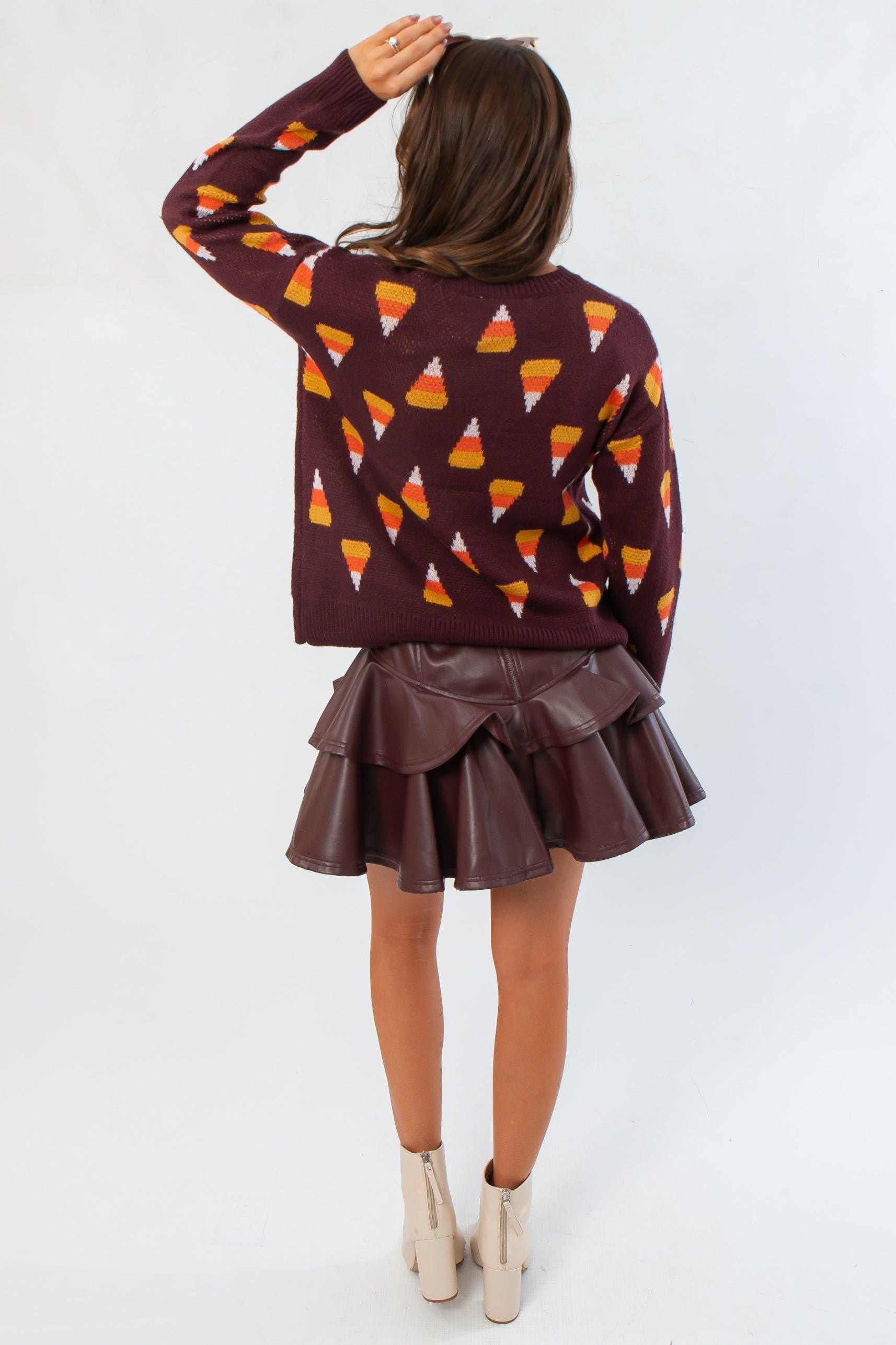 Back view of Candy Corn Sweater - Candy Corn Brown showing full candy corn pattern and relaxed fit. Perfect seasonal top for autumn outfits.