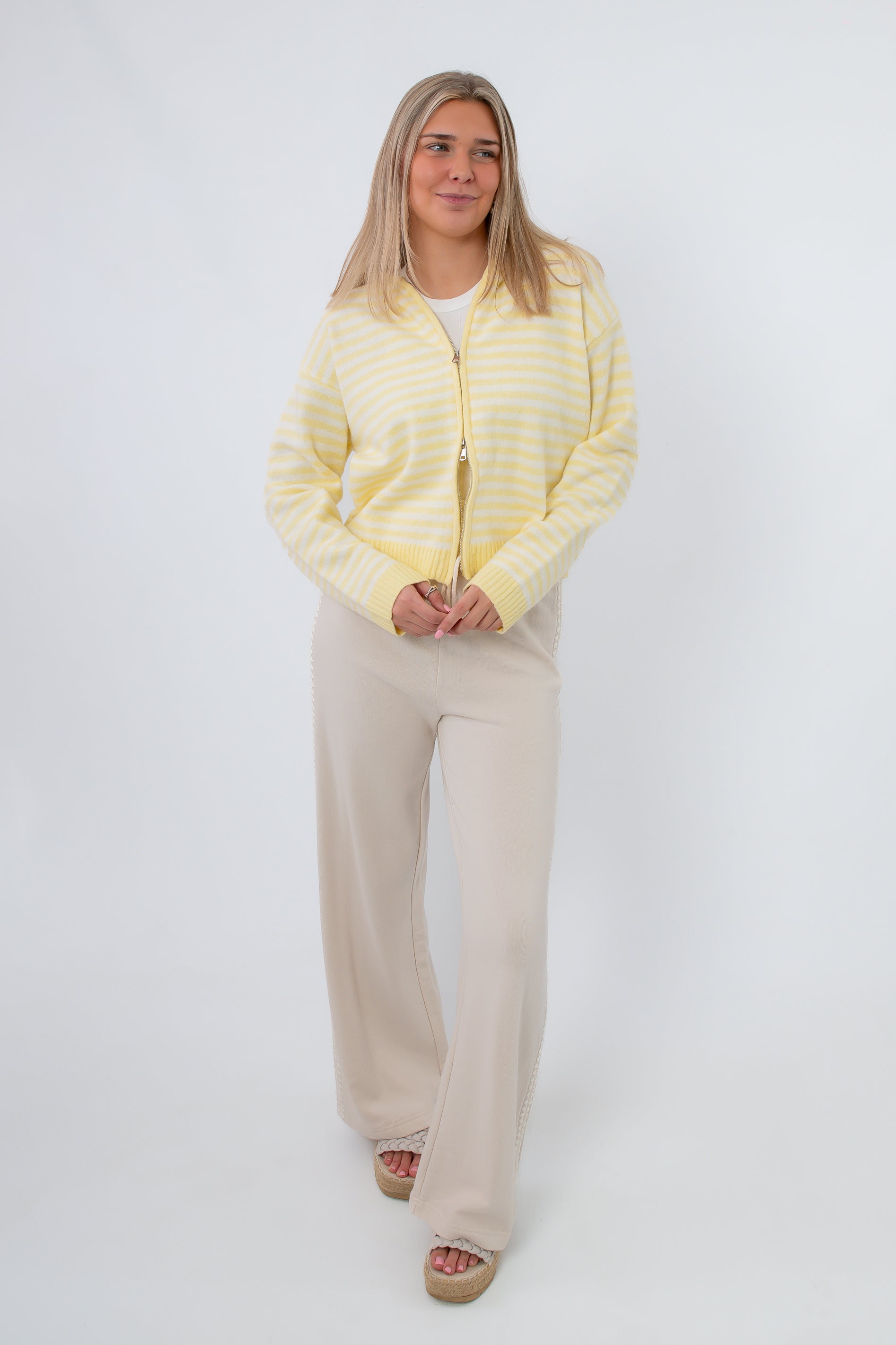 Yellow striped hoodie with hood, front view, casual women's outerwear