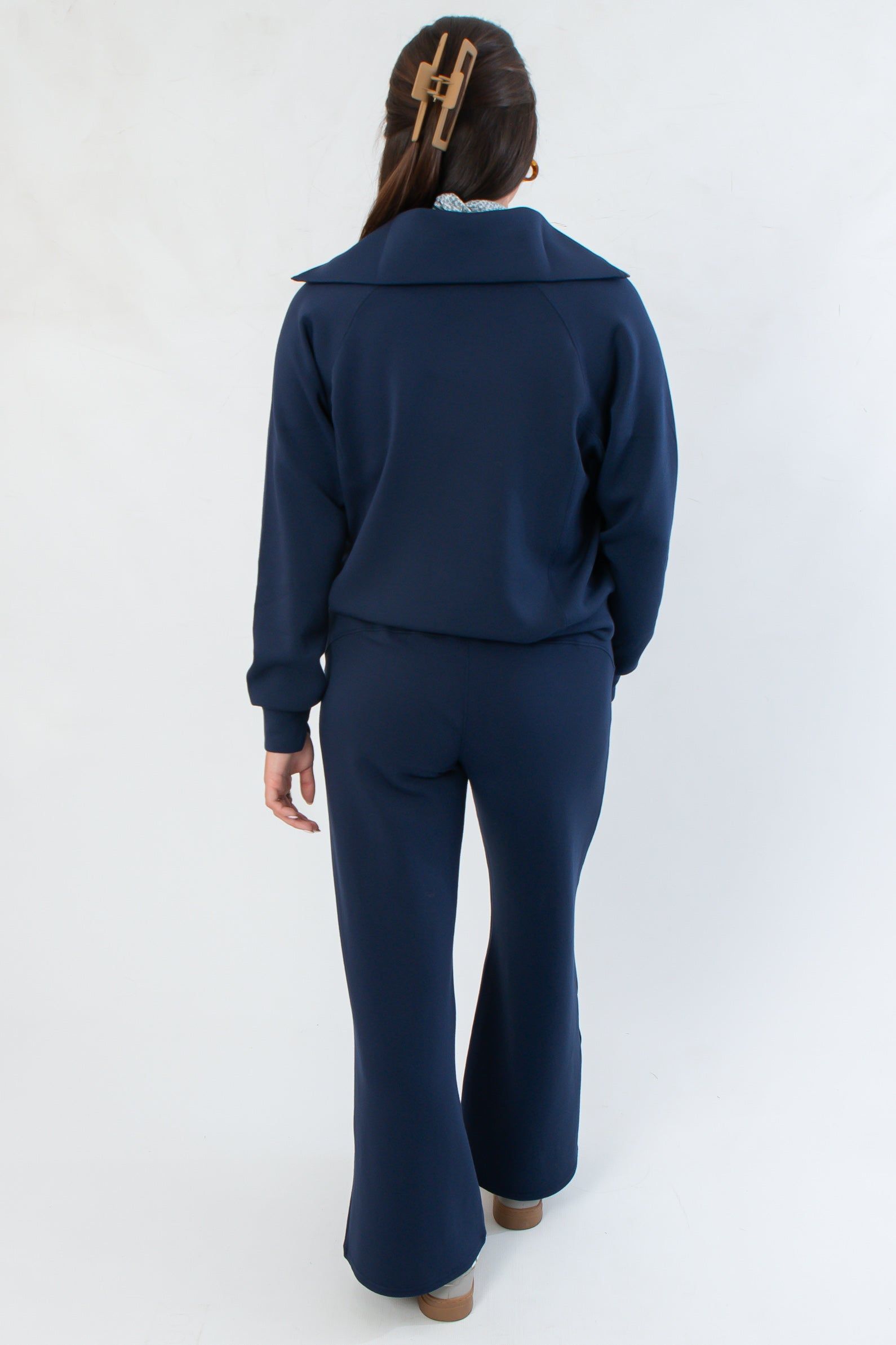 Back view of Spanx Navy AirEssentials Half Zip showcasing its relaxed silhouette and soft, breathable fabric for all-day comfort.