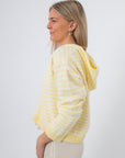 Side profile of yellow striped zip hoodie, women's casual outerwear