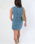 Steve Madden Denim Dress - Averi Blue Denim | Fashion. Back view of sleeveless blue denim dress showing seam details and a straight hemline.