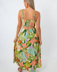 Tropical floral maxi dress with cutout waist and ruffled straps