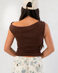 Back view of Friday Feeling Brown Asymmetrical Top showing gathered stretch fabric and off-shoulder design.