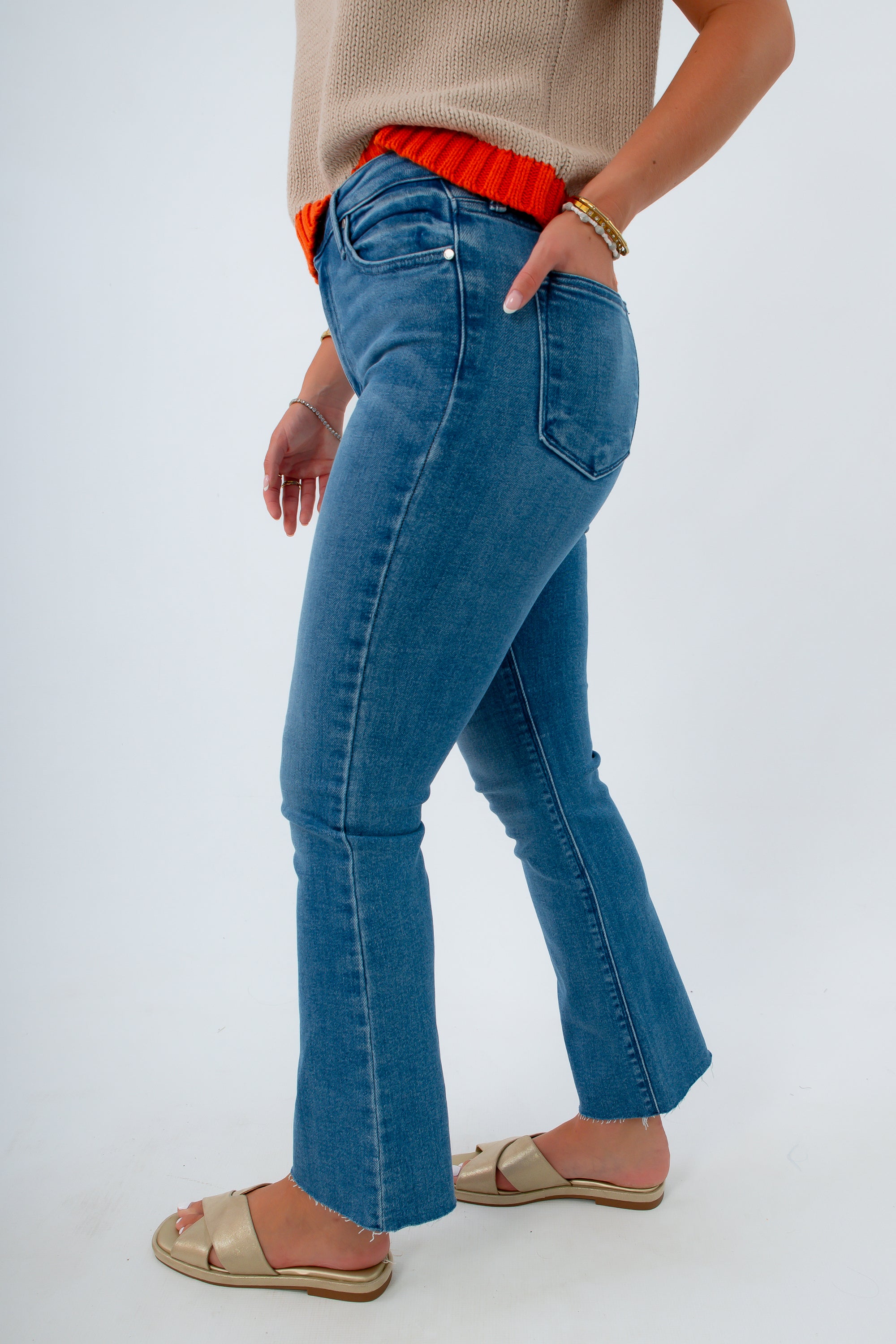 Versatile denim for fall transitioning, medium-wash denim, cropped flare denim