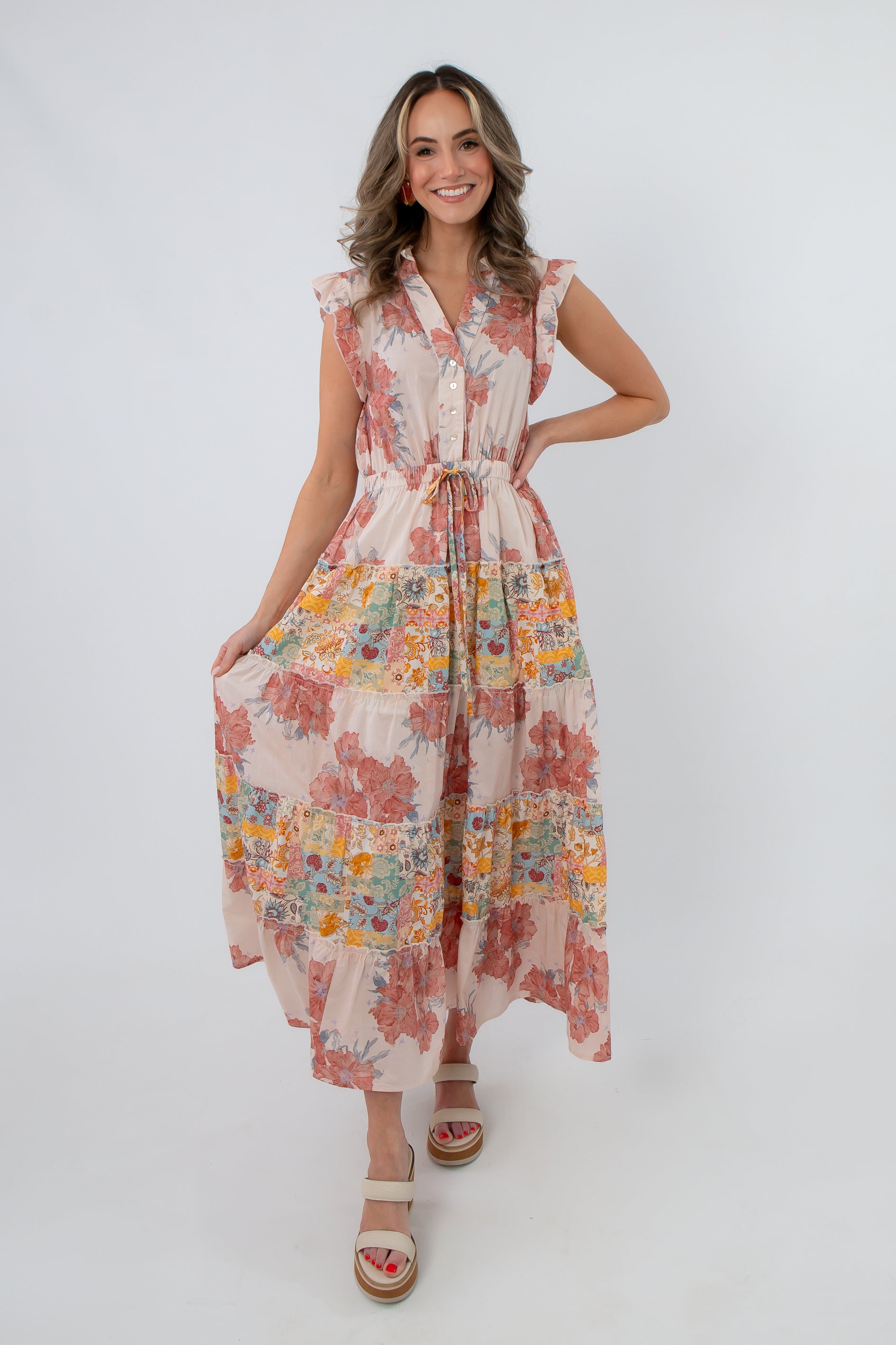 Front view of Peach Patchwork Floral Maxi Dress with colorful floral pattern