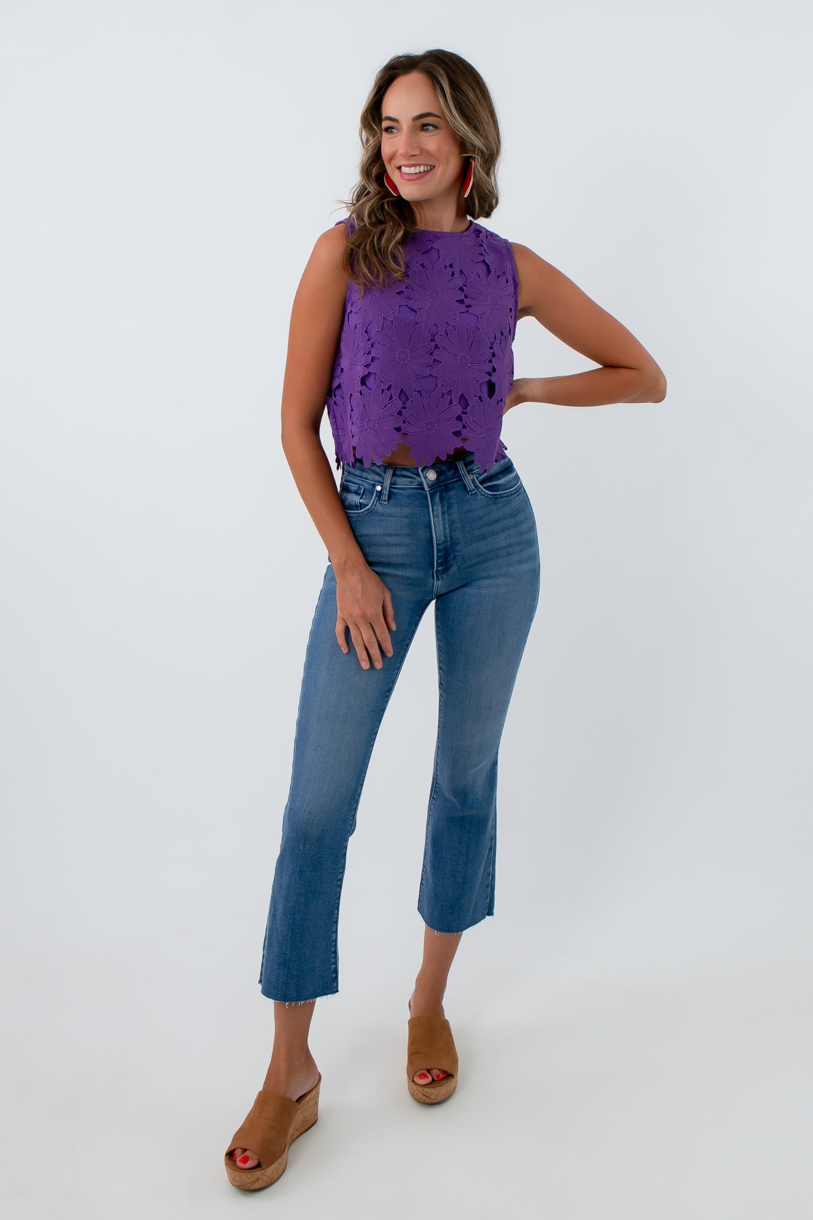 bright purple floral lace crochet overlay top with orange and gold accessories