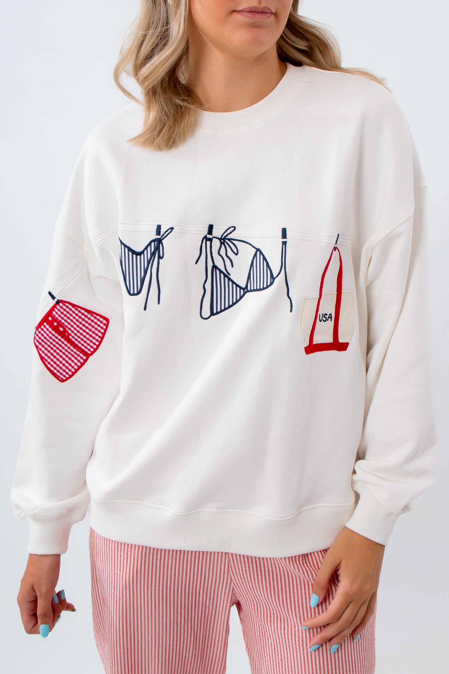 clothesline graphic with bikini and boxer short and usa boat and tote bag