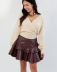 Alpaca Dreams Ivory Wrap Sweater – Luxury Women’s Alpaca Cardigan Top styled with a brown ruffled leather skirt. Cozy and elegant for fall layering.